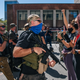 Armed right-wing groups staged a counter protest to activists demanding justice for Breonna Taylor at the Kentucky Derby.